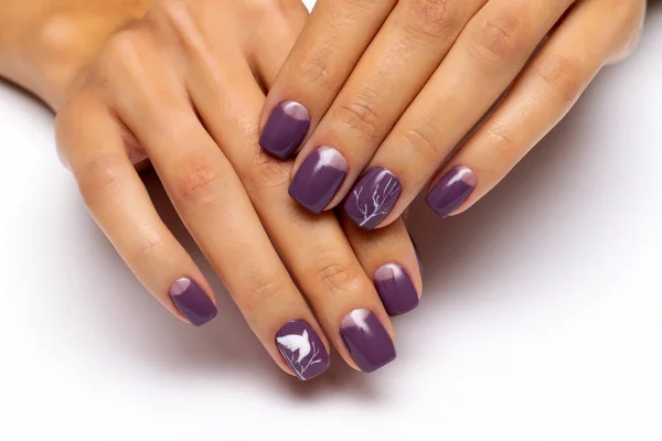 Gel autumn nail design. Purple moon manicure with painted white doves on the nails and white wood with silver on short square nails.