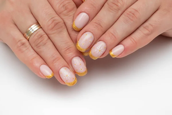 Manicura Inverno Manicure Francês Brilhante Dourado Com Flocos Neve Brancos — Fotografia de Stock