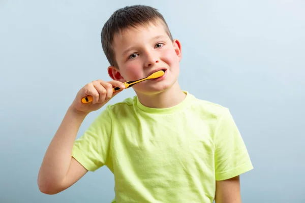 Child Shirt Brushing Teeth Toothbrush Blue Background Dental Hygiene — Foto Stock