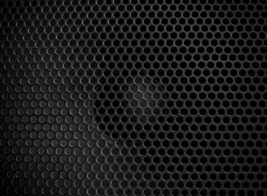 Modern akustik sistemlerde bal peteği olan koruyucu metal ızgara. Müzik hoparlörleri yakın plan. Soyut arkaplan yakın plan, yumuşak odak ve güzel bokeh.