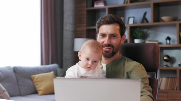 Father Maternity Leave Working Home Office Laptop Small Child His — Stockvideo