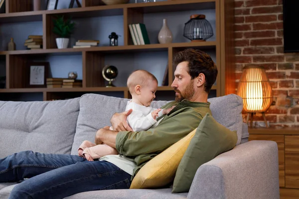 Dad Plays His Little Baby Couch Cozy Apartment Fatherly Love —  Fotos de Stock