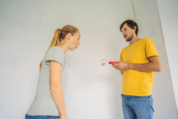 Man Woman Rollers Painting Walls Man Very Small Bolster Symbolizing — Stok fotoğraf