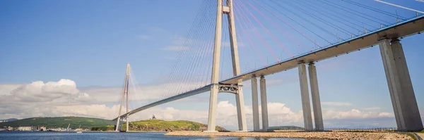 BANNER, LONG FORMAT Cable-stayed bridge to Russian Island. Vladivostok. Russia. Vladivostok is the largest port on Russias Pacific coast and the center of APEC Forum — Stock Photo, Image