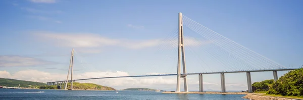 BANNER, LONG FORMAT Cable-stayed bridge to Russian Island. Vladivostok. Russia. Vladivostok is the largest port on Russias Pacific coast and the center of APEC Forum — Stock Photo, Image