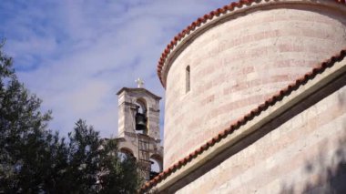 A church with a bell in the Old Town of Budva. The famous tourist spot in Montenegro