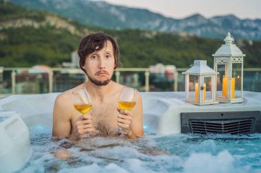 Portrait embarrassed man relaxing at hot tub to whom the woman did not come on a date. February 14 concept. St. Valentines Day clipart