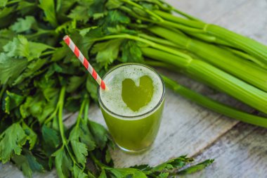 Celery Juice, Healthy Drink, bunch of celery on a wooden background