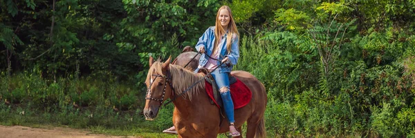 Beautiful woman riding a horse in countryside BANNER, LONG FORMAT — Stock Photo, Image
