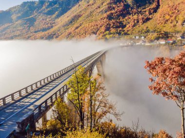 Montenegro. Dzhurdzhevich Bridge Over The River Tara foggy morning