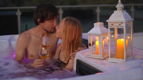 Young Man Woman Relaxing Hot Tub Rooftop View Mountains Sunset — Stock Video