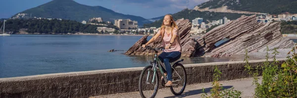 Woman Tourist Bicycle Explores Budva Montenegro Cycling Montenegro Concept Banner — Stok fotoğraf