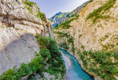 The purest waters of the turquoise color of the river Moraca flowing among the canyons. Travel around Montenegro concept.