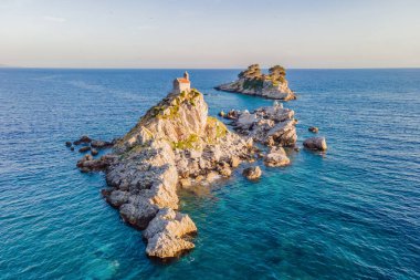 Sveta Nedelja is an islet on the Adriatic Sea, in Montenegrin municipality of Budva. It is located opposite the town of Petrovac na Moru in Montenegro. It has a small church on it.