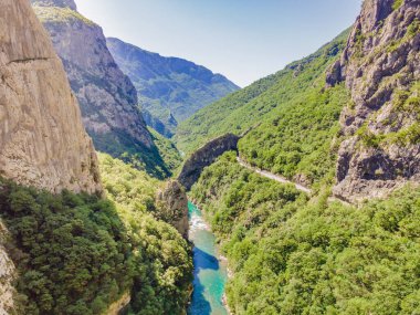 The purest waters of the turquoise color of the river Moraca flowing among the canyons. Travel around Montenegro concept.