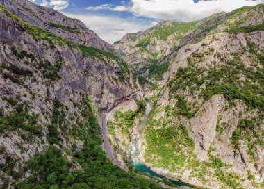 The purest waters of the turquoise color of the river Moraca flowing among the canyons. Travel around Montenegro concept.