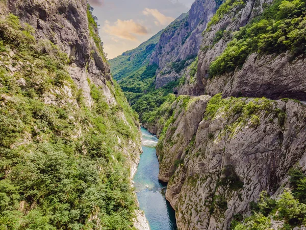 The purest waters of the turquoise color of the river Moraca flowing among the canyons. Travel around Montenegro concept.