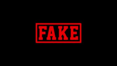 Siyah arkaplanda sahte bir simge var. Video projeniz için yaratıcı 4k görüntüleri.