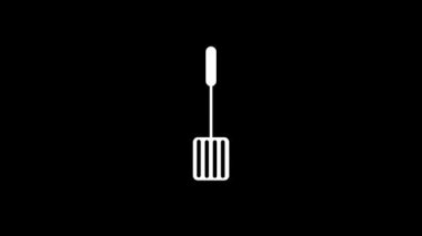 Siyah arka planda beyaz mutfak spatulası resmi.