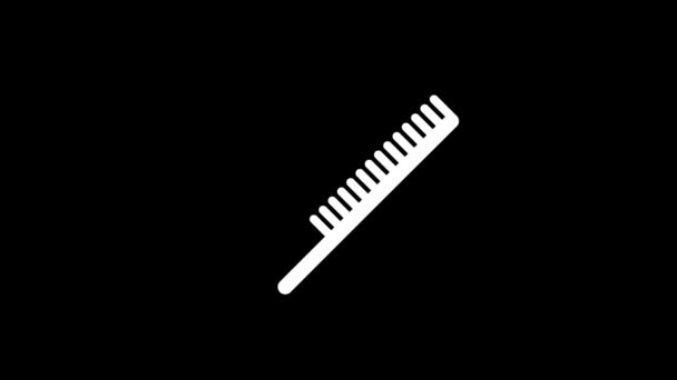 White picture of comb on a black background. — Stock Video