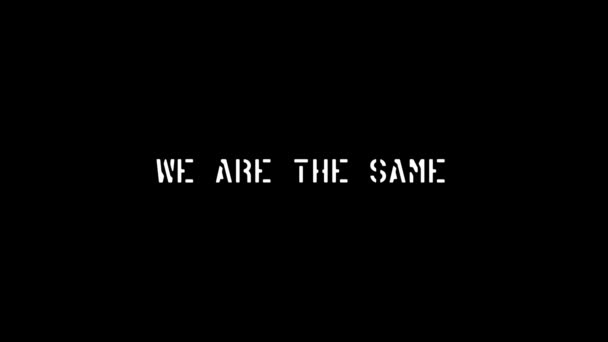 White picture of we are the same on a black background. — Vídeos de Stock