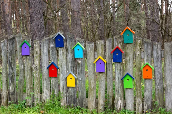 Wooden Fence Decorative Elements Form Multicolored Stylized Birdhouses Colored Decorative — стоковое фото