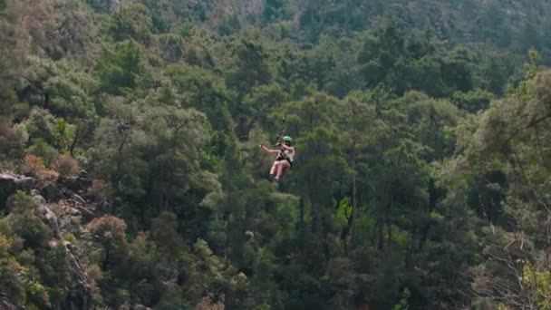 Turkey Woman Rides Zipline Middle Forest Mid Shot — Stock Video