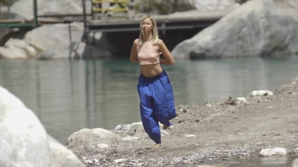 Yoga Water Stream Woman Does Meditative Exercises Mid Shot — Stock Video