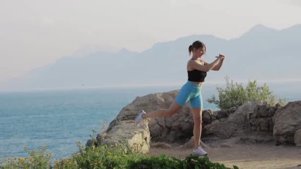 Fitness Outdoors Woman Training Hill Sea Mid Shot — Stock Video