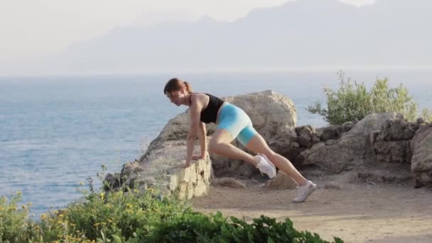 Sports Outdoors Fitness Woman Working Out Hill Sea Mid Shot — Stock Video