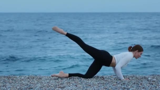 Fitness Outdoors Woman Stretching Blue Sea Mid Shot — Stockvideo