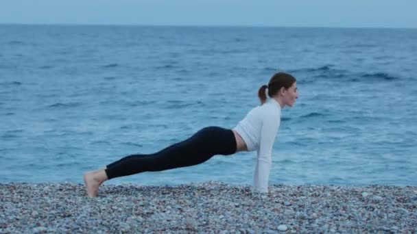 Fitness Outdoors Sportive Woman Stretching Blue Sea Mid Shot — Stock Video