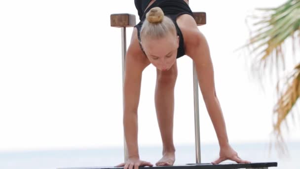 Young Woman Stretching Her Legs Body Sports Ground Beach Mid — Αρχείο Βίντεο