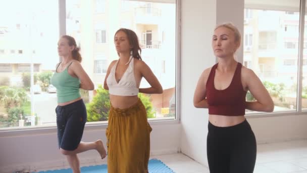 Three Women Having Yoga Classes Studio Balancing One Leg Mid — Video