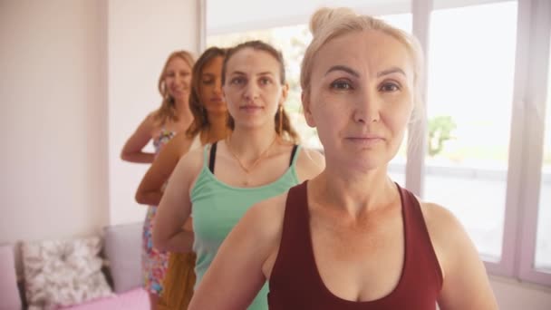 Four Women Different Ages Yoga Studio Mid Shot — 图库视频影像
