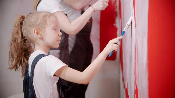Little Girl Painting Wall Paint Brush Mid Shot — 스톡 사진