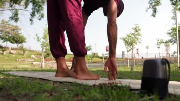 Arabian Man Doing Yoga Park Mid Shot — 图库视频影像