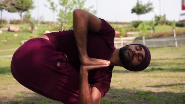 Arabian Man Doing Yoga Exercises Park Mid Shot — Stock videók