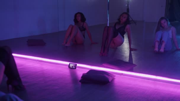 Three Sexy Women Dancers Practicing Mirror Studio Neon Lighting Mid — Stock Video