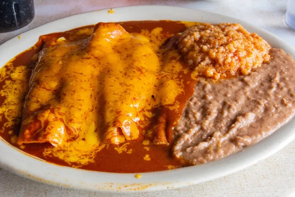 Plate of Enchiladas dish popular in Mexico and American Southwest.