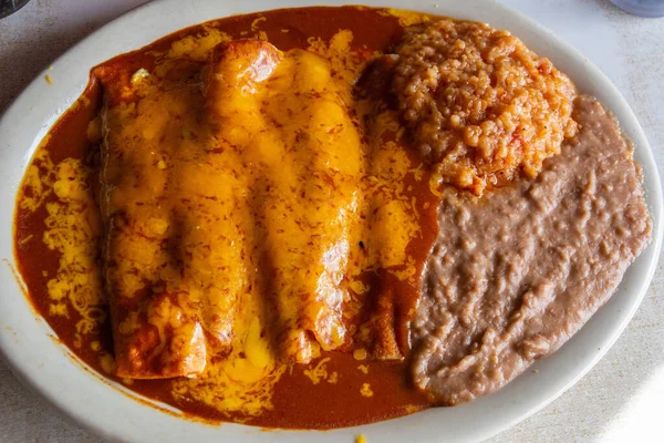 Plate of Enchiladas dish popular in Mexico and American Southwest.