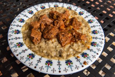 Plate of Turkish dish hunkar begendi (Turkish braised lamb and eggplant)