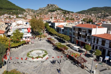 Mugla, Turkey - November 6, 2018. View over Mugla, with the Main Square, residential buildings, commercial properties and people.