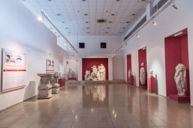 Izmir, Turkey - January 25, 2019. Interior view of Izmir Museum of History and Art in Izmir, with ancient sculptures.