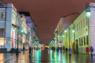 Moscow, Russia - November 10, 2017. View of Kamergersky Lane in downtown Moscow. View after rain in the evening, with people.
