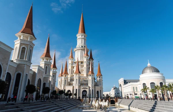 Belek, Antalya, Turkey - February 11, 2019. Exterior view of the Chateau building at the Land of Legends theme park in Belek, Turkey, with chariot monument.