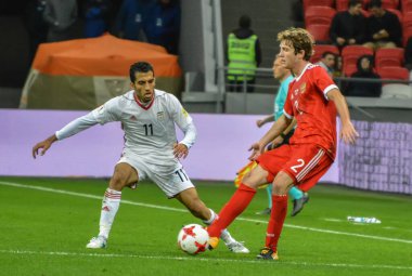 Kazan, Rusya - 10 Ekim 2017. İran Millî Futbol Takımı orta saha oyuncusu Vahid Amiri, Rusya 'ya karşı uluslararası dost Rusya - İran (1-1) maçında Rusya defans oyuncusu Mario Fernandes' e karşı.)