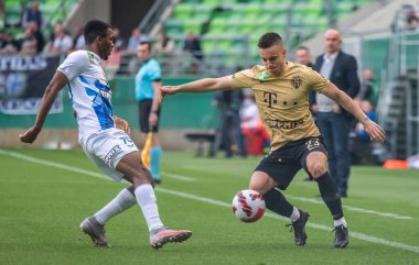 Budapest, Hungary - May 4, 2022. Ferencvaros midfielder Lorand Paszka against Zalaegerszeg striker Meshack Ubochioma during Hungarian OTP Bank Liga Gameweek 31 match Ferencvaros vs Zalaegerszegi (5-3)