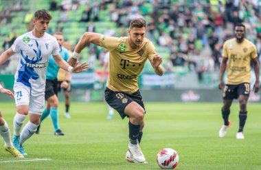 Budapest, Hungary - May 4, 2022. Ferencvaros midfielder Balint Vecsei in action during Hungarian OTP Bank Liga Gameweek 31 match Ferencvaros vs Zalaegerszegi (5-3).