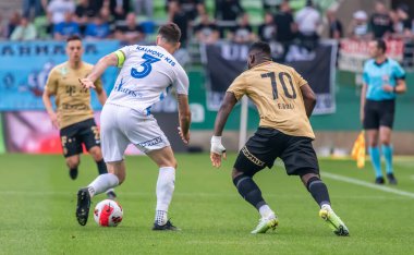 Budapest, Hungary - May 4, 2022. Zalaegerszegi defender Kalnoki Kis David and Ferencvaros striker Franck Boli during Hungarian OTP Bank Liga Gameweek 31 match Ferencvaros vs Zalaegerszegi (5-3)